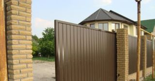Купить откатные ворота из профнастила Сатка, цена от 1784 руб.